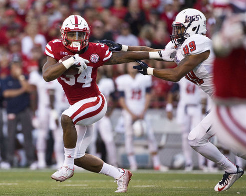 Who will win the Huskers starting running back spot?