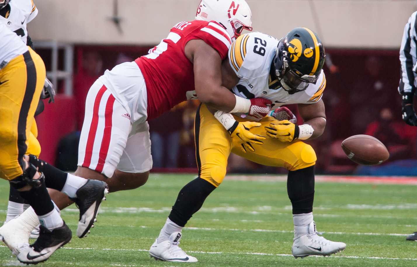 Iowa @ Nebraska: Who wins the season finale, and by what score?