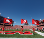 Which team is the bigger game this year for Huskers football?