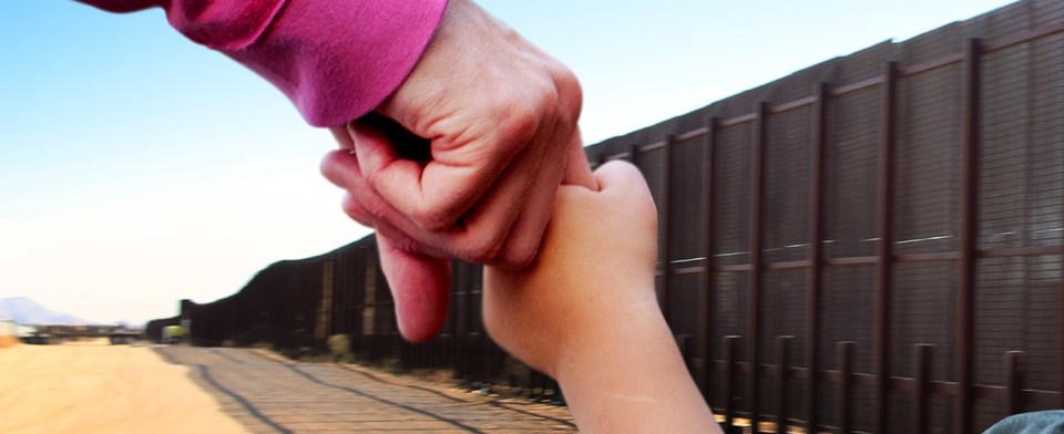 Should it be a crime for parents to cross the border w/ children?