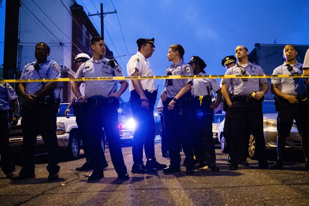 Should law enforcement take extra precautions due to shootings?
