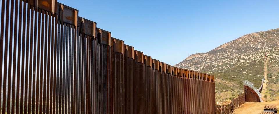 Should defense money be used to continue funding the wall?