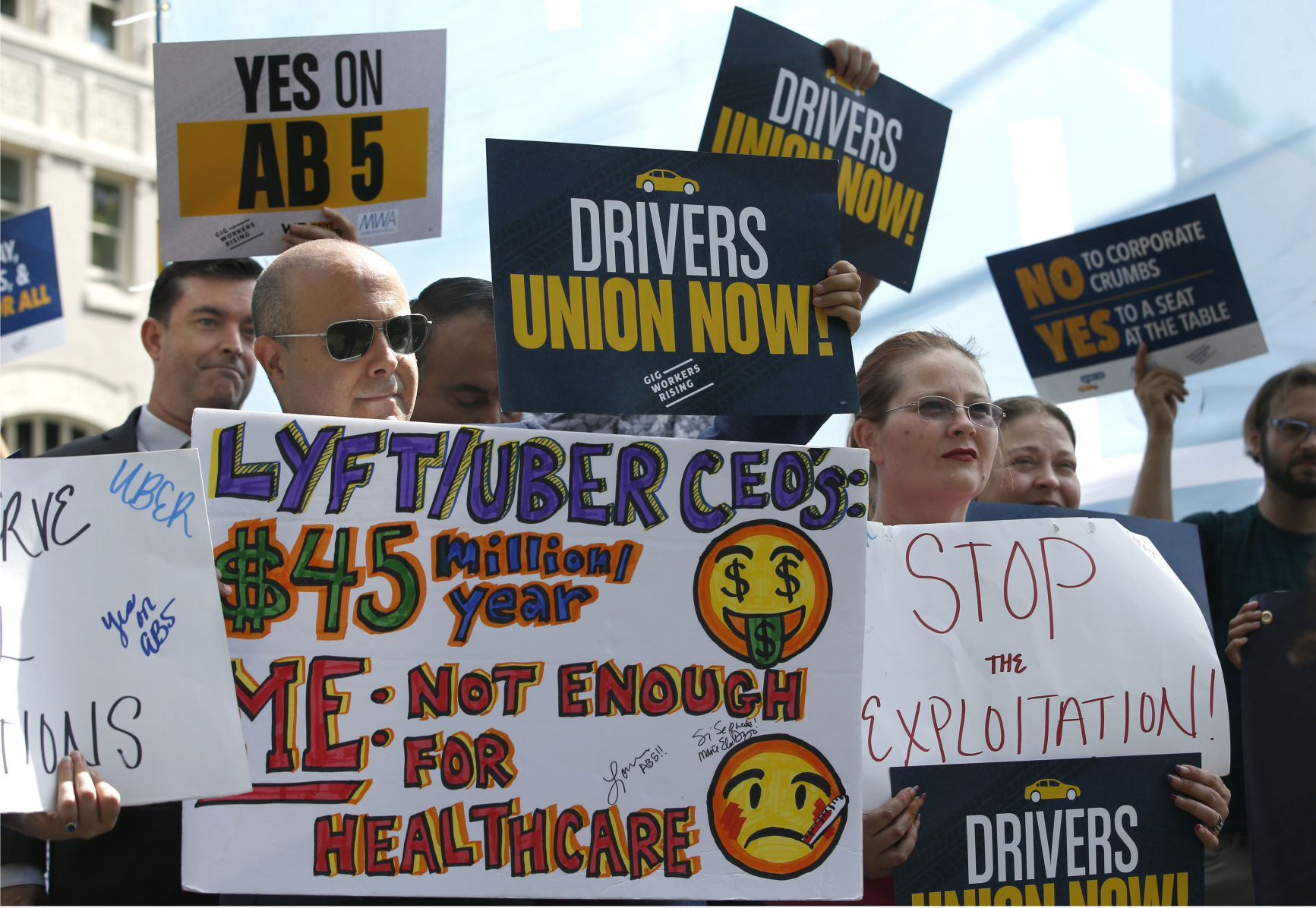 Should Uber and DoorDash workers get insurance and wage benefits?