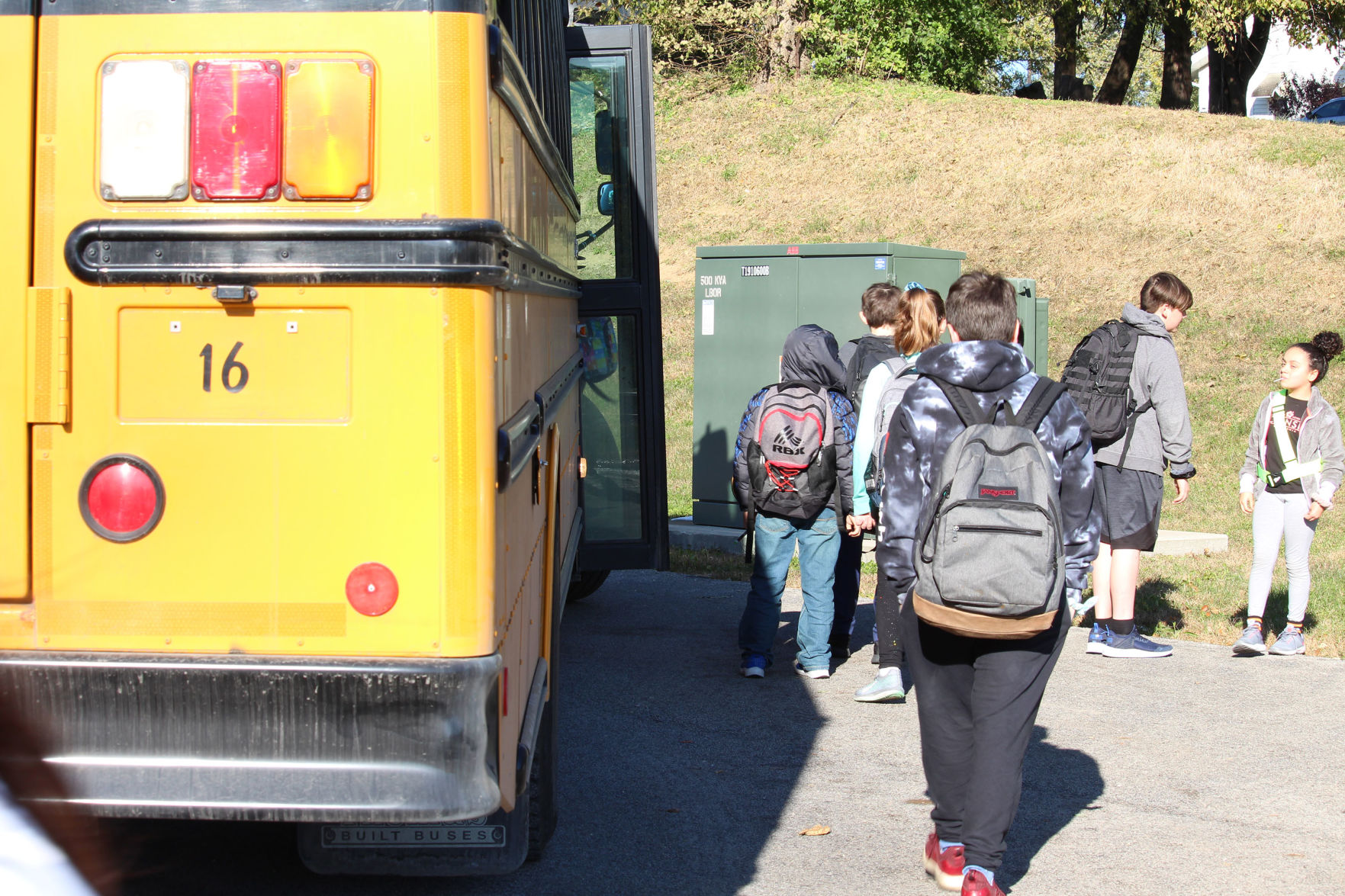 Should the SJSD bus students who live within a mile of school?