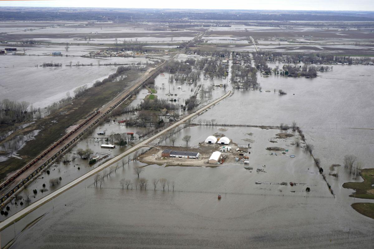 Who should have a larger role in flood protection improvements?
