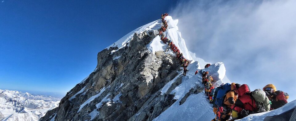 Should the government of Nepal restrict the number of climbers attempting to scale Mt. Everest?