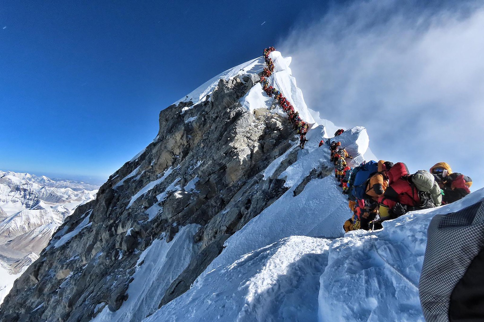 Should the government of Nepal restrict the number of climbers attempting to scale Mt. Everest?