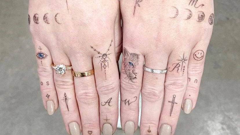 Thumbs up or thumbs down on hand tattoos?