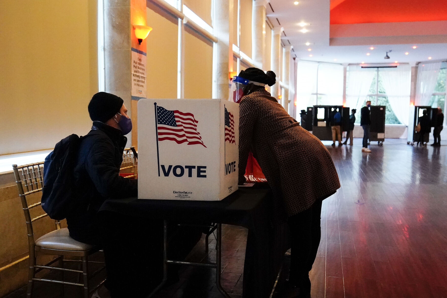 Should a driver's license or another photo ID be required to vote?