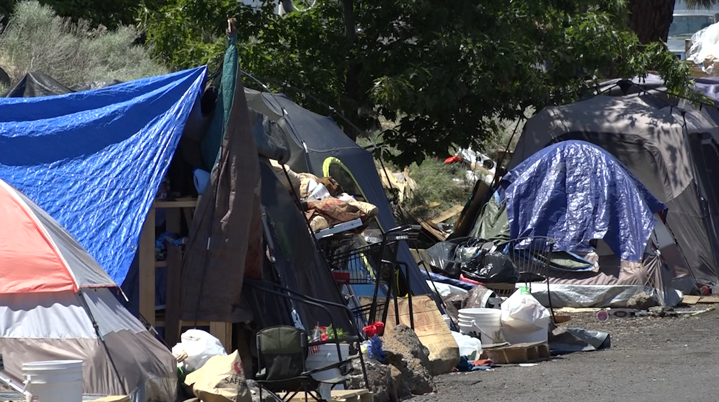 Do you think there should be a permanent location for the houseless to camp? If so, where?