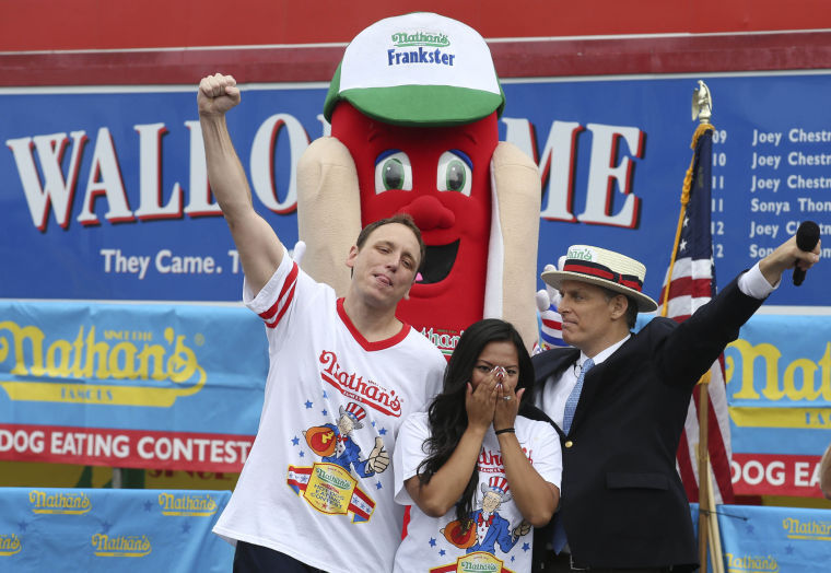 When a guy eats 60 hot dogs in an Independence Day contest, are you impressed or grossed out?