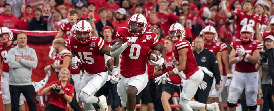 Will the Huskers have more yards rushing or passing this weekend against Michigan?