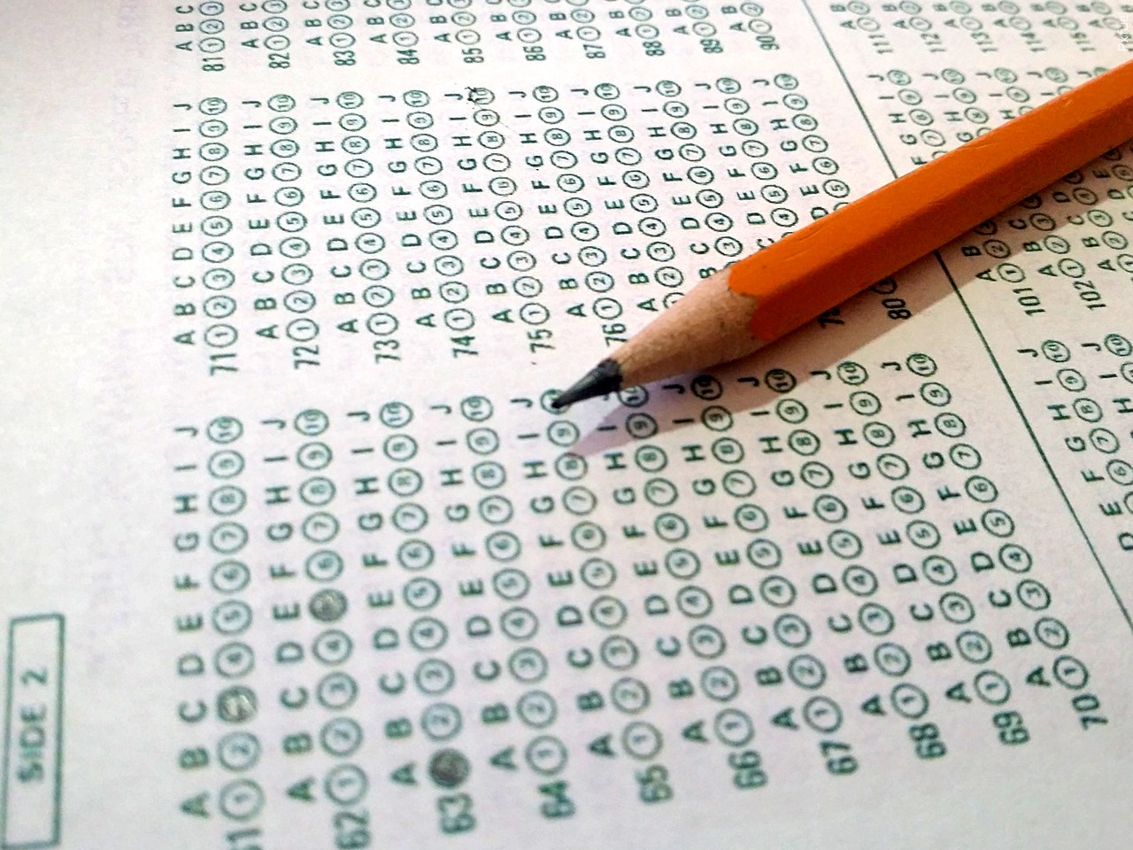 Should college entrance exams be required for admission?