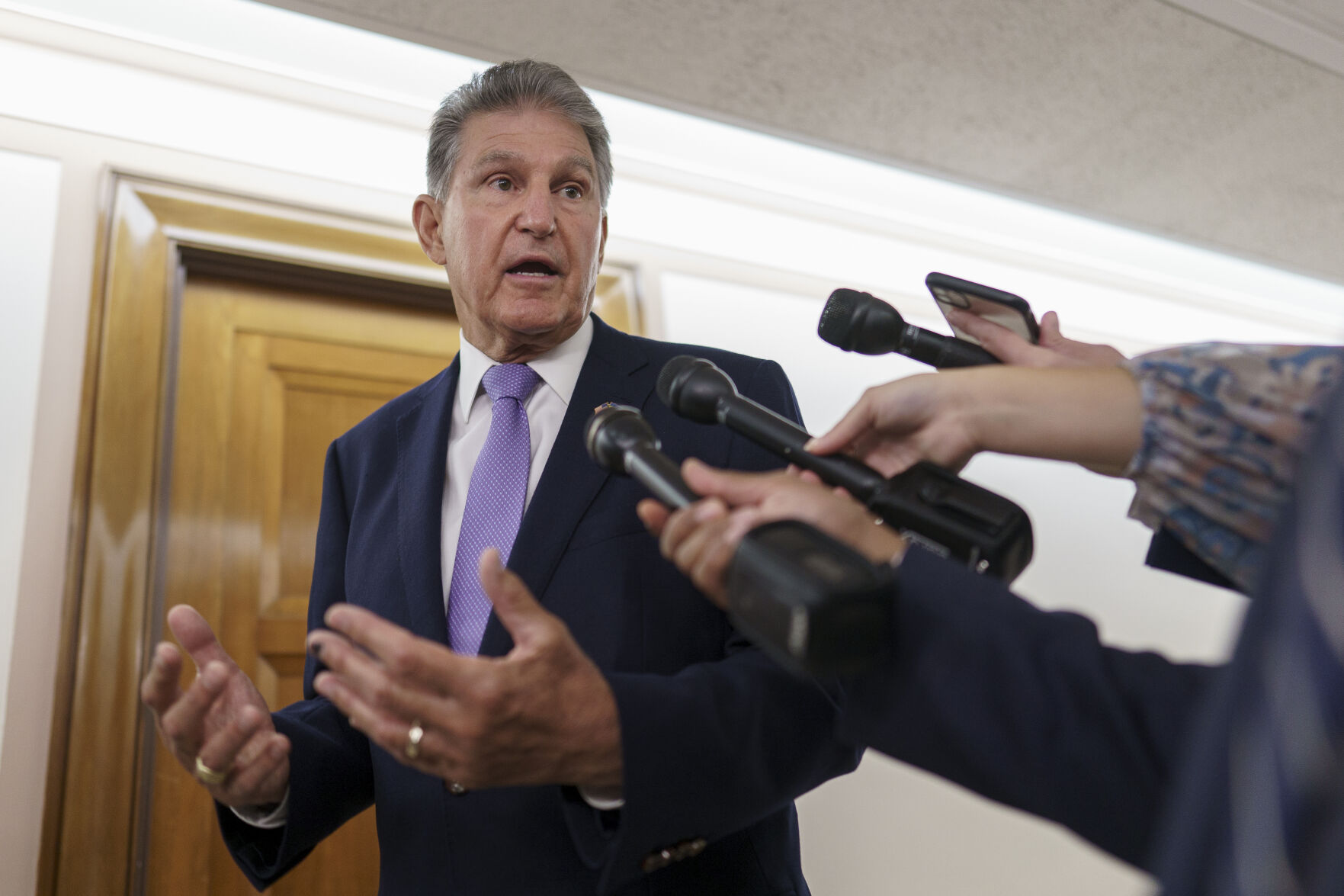 Are you glad that Sen. Joe Manchin is now supporting the climate change bill in Congress?