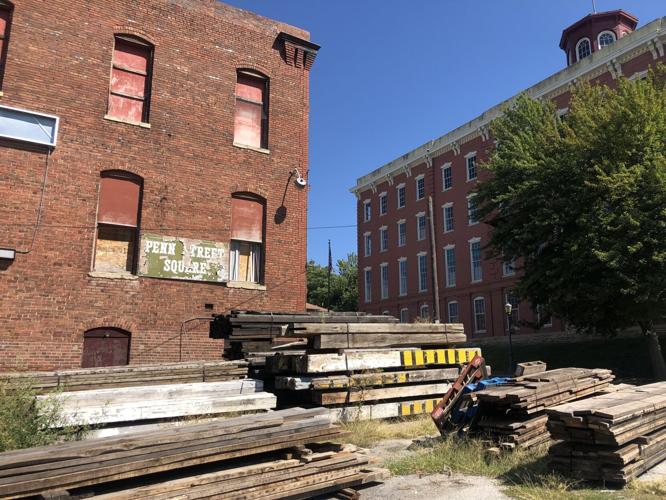 Should the city try to save or demolish older abandoned buildings?