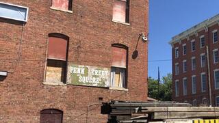 Should the city try to save or demolish older abandoned buildings?