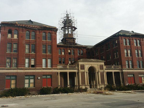 Should the Livestock Exchange Building be saved or demolished?