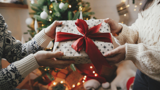 Do you buy gifts for everyone or do you do a secret Santa system for Christmas? 