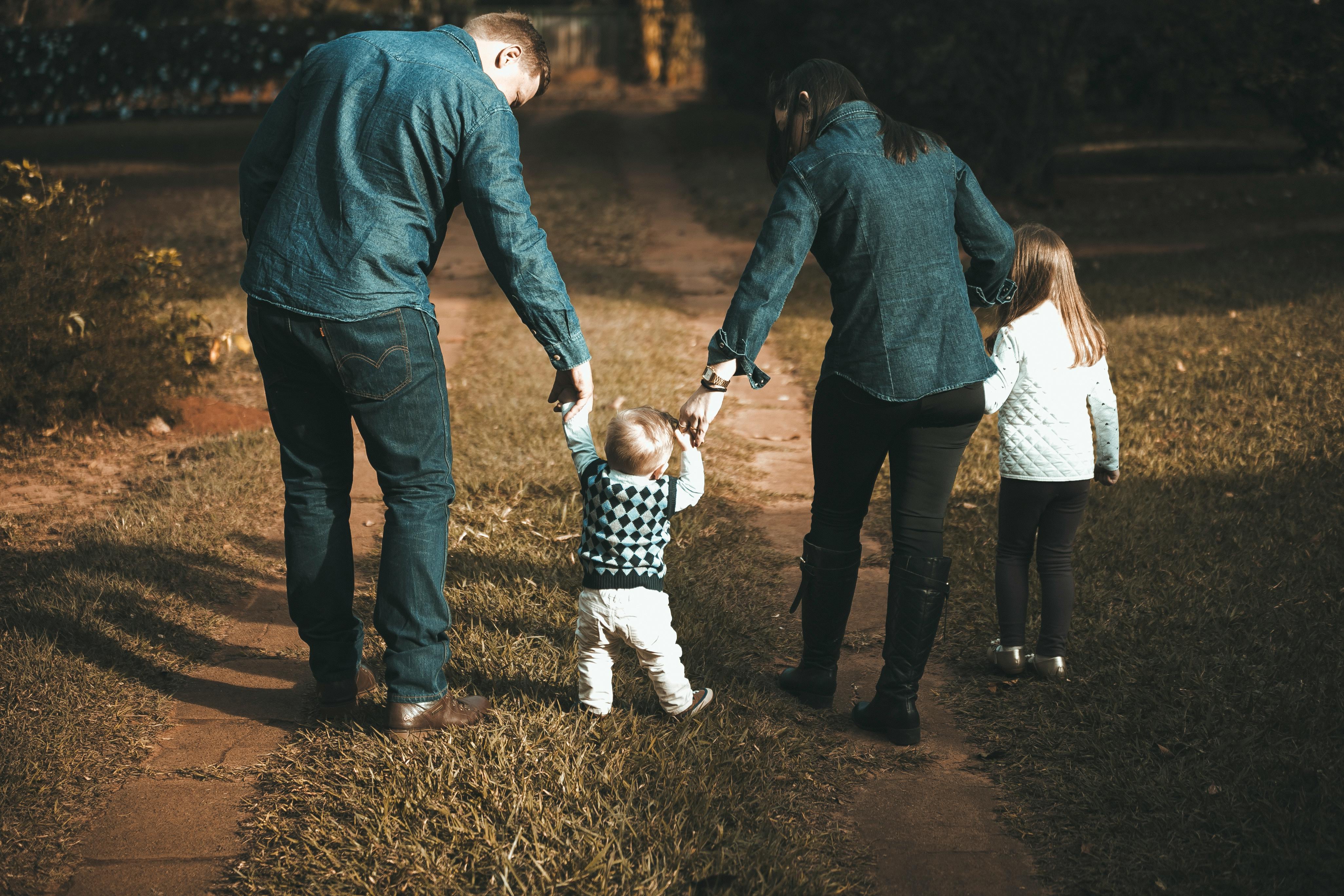 Should entrepreneurs prioritize work or family during the early stages of their business?