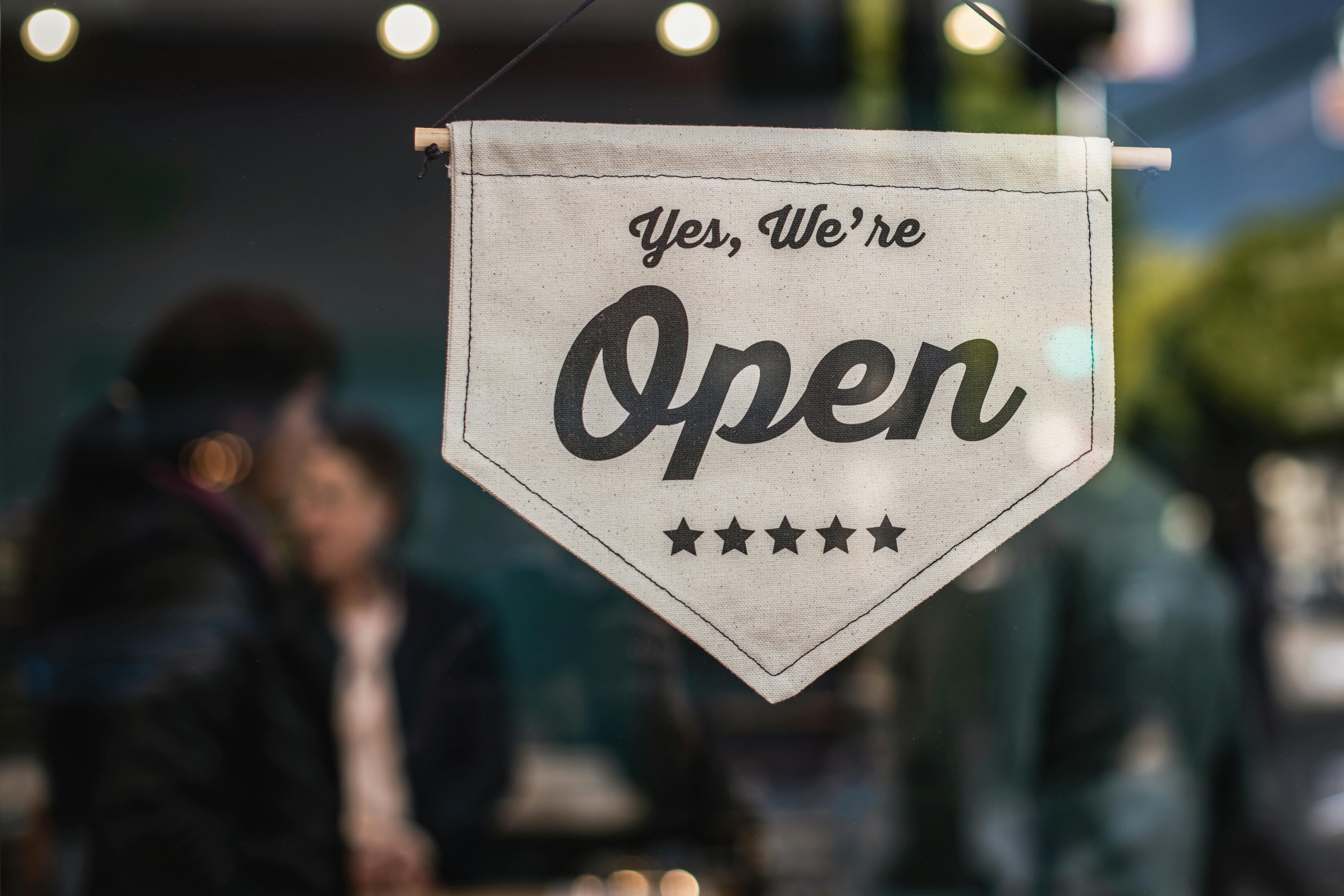 Should cities focus on small businesses or attracting large corporations?