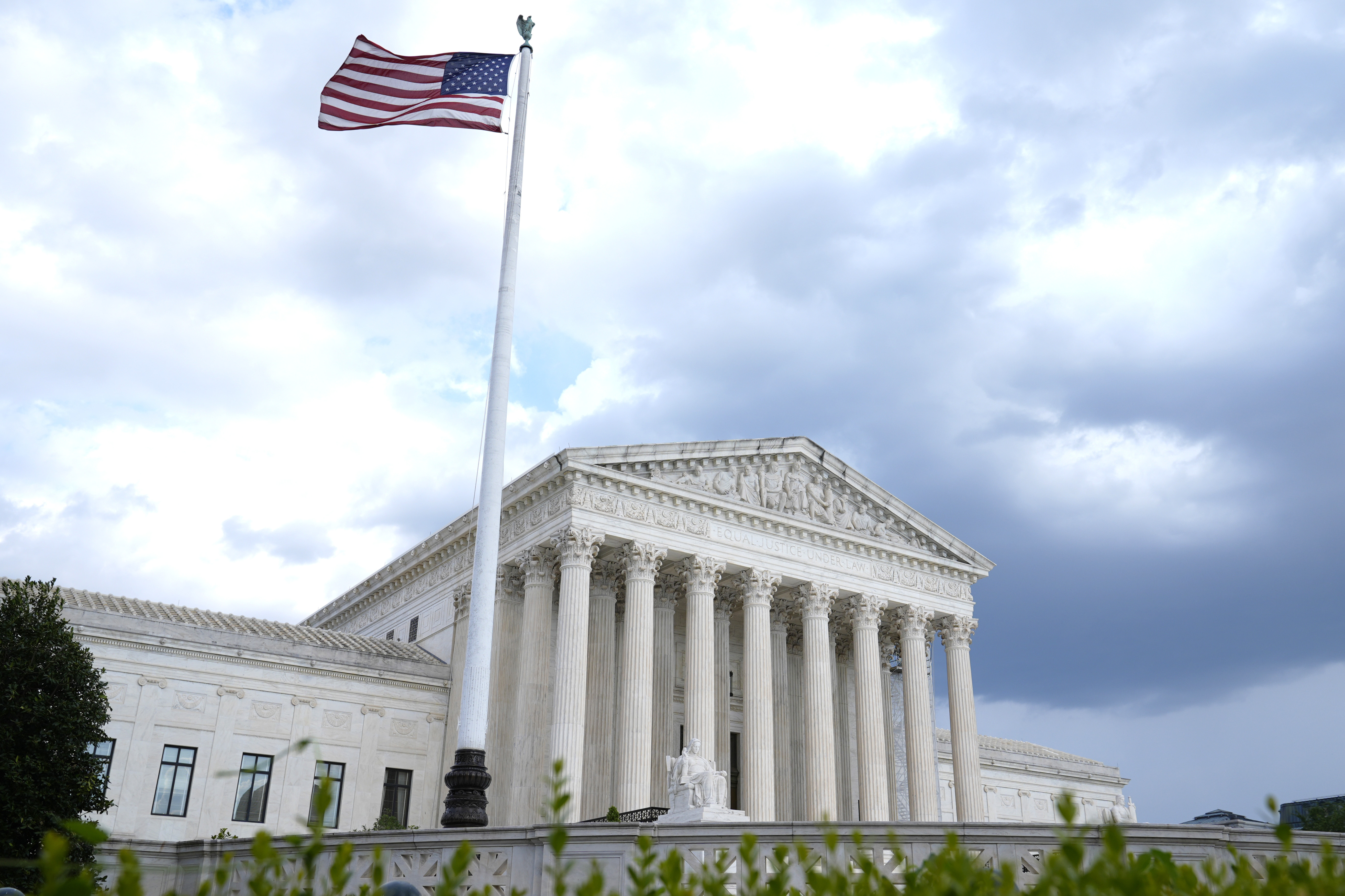 Should term limits and a code of conduct be implemented for the Supreme Court?
