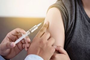 What should schools/daycares do about unvaccinated children?